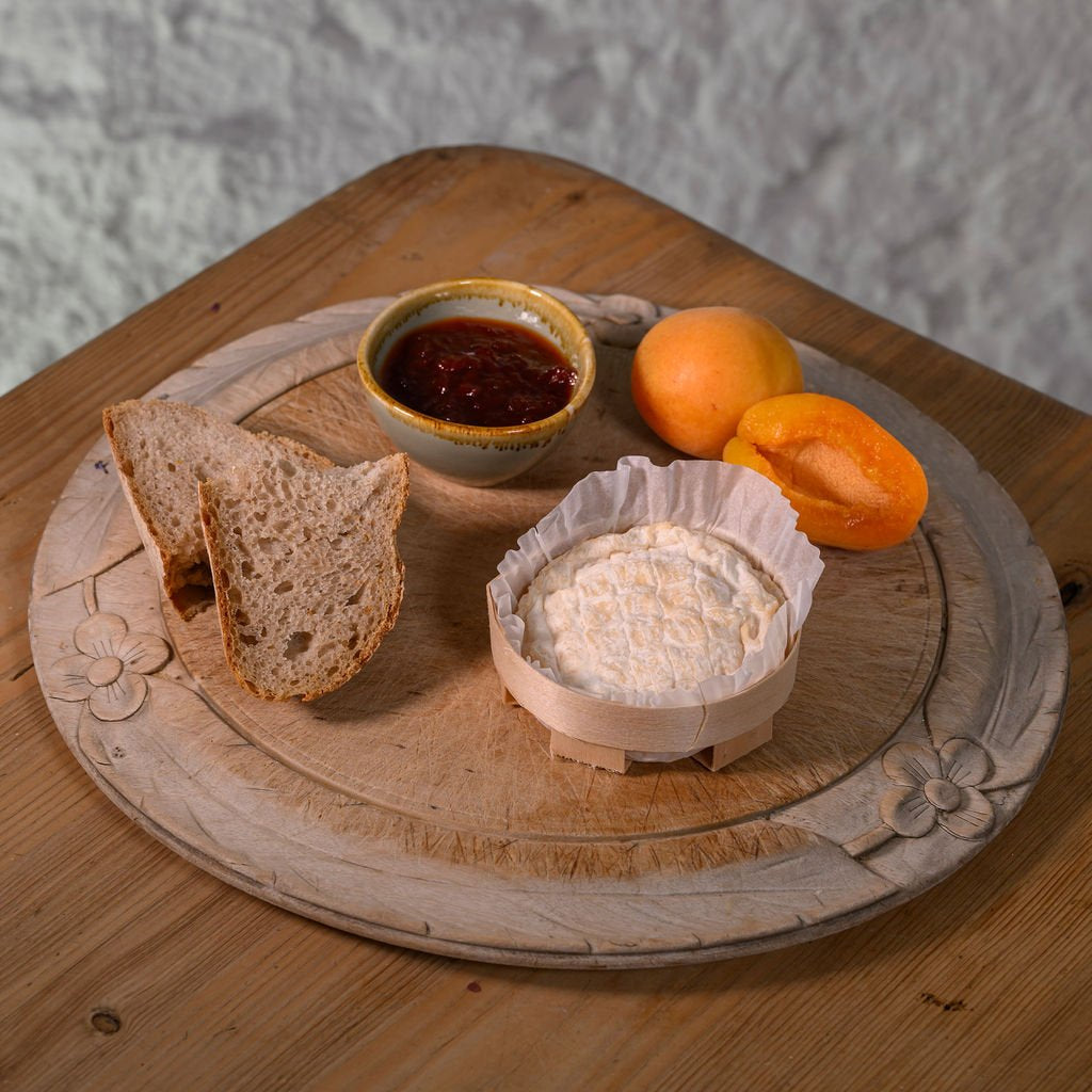 St Jude soft cheese with bread, apricots and chutney