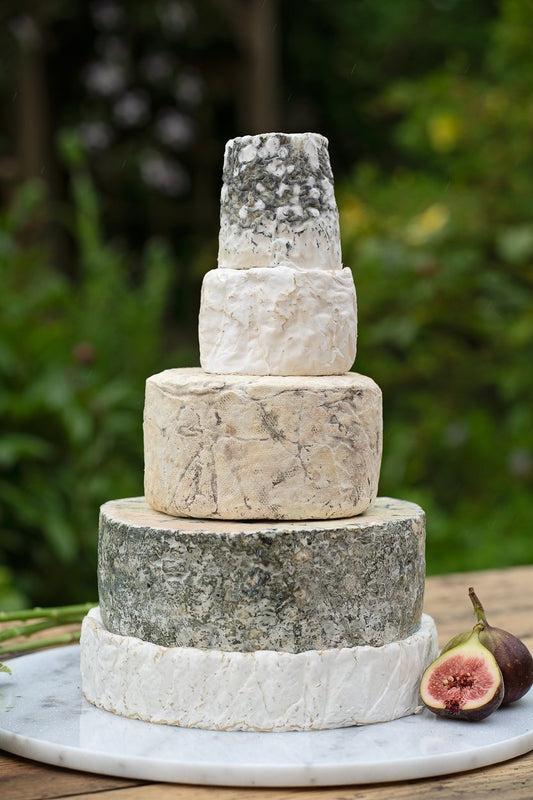 Five-tier celebration cheese cake with figs